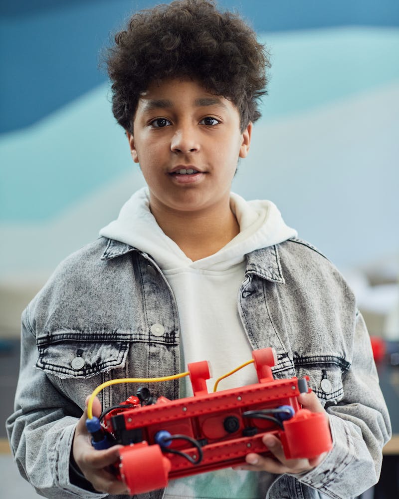 Student smiling while working on project